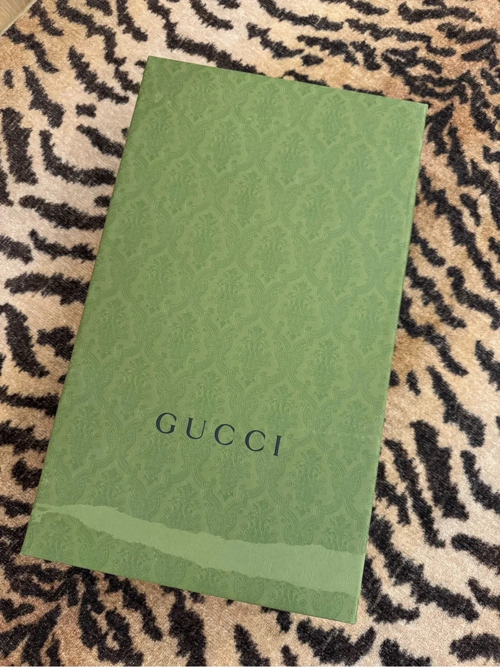 GUCCI Women’s Black Leather Knee-High Riding Boots with Gold Buckle